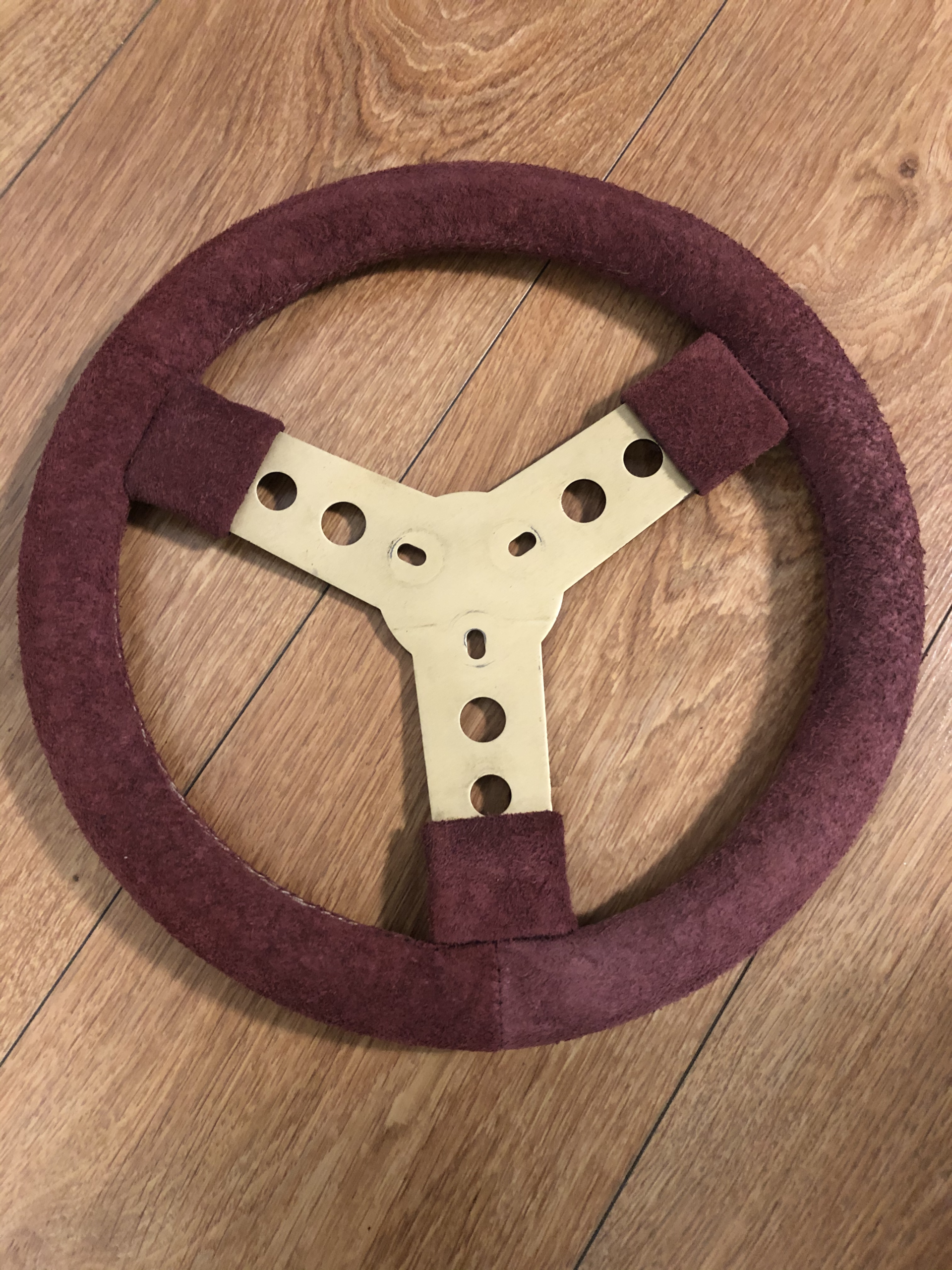 Professionally refurbished go-kart steering wheel after restoration